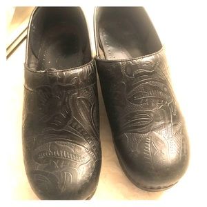 Dansko black leather tooled clogs